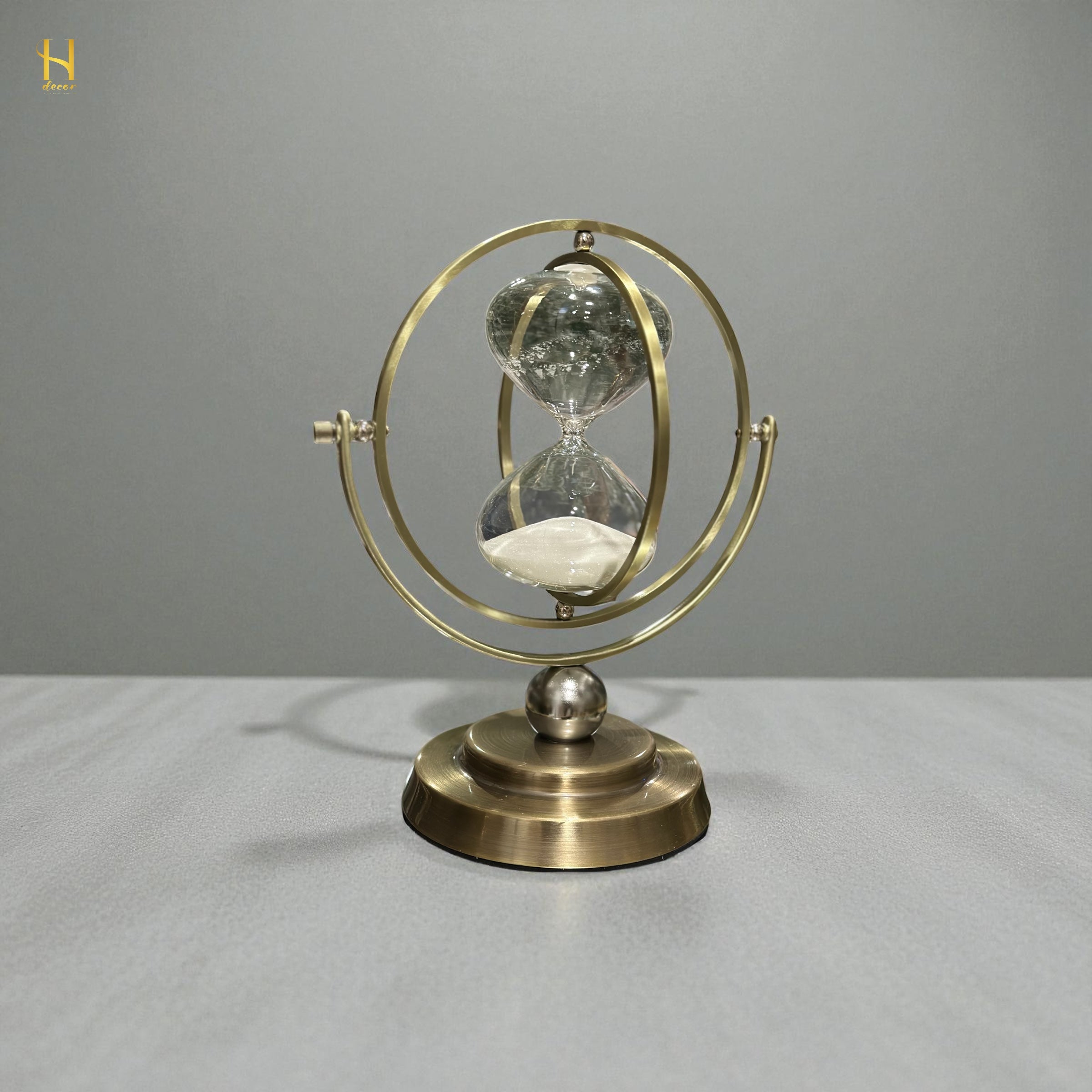 Brass-Tone Metal Hourglass with 360° Rotating Globe Frame