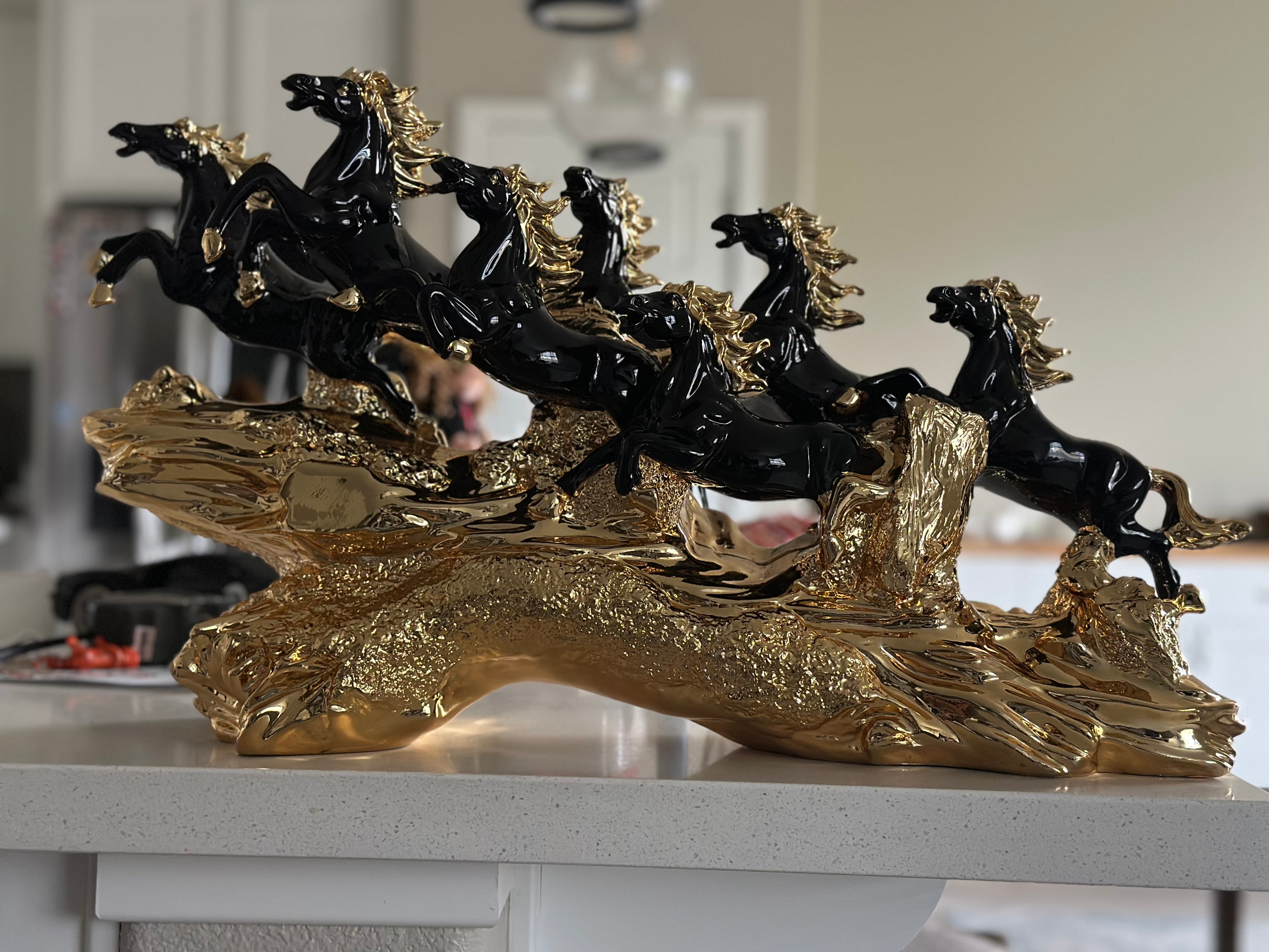 Seven Black and Golden Horses Sculpture