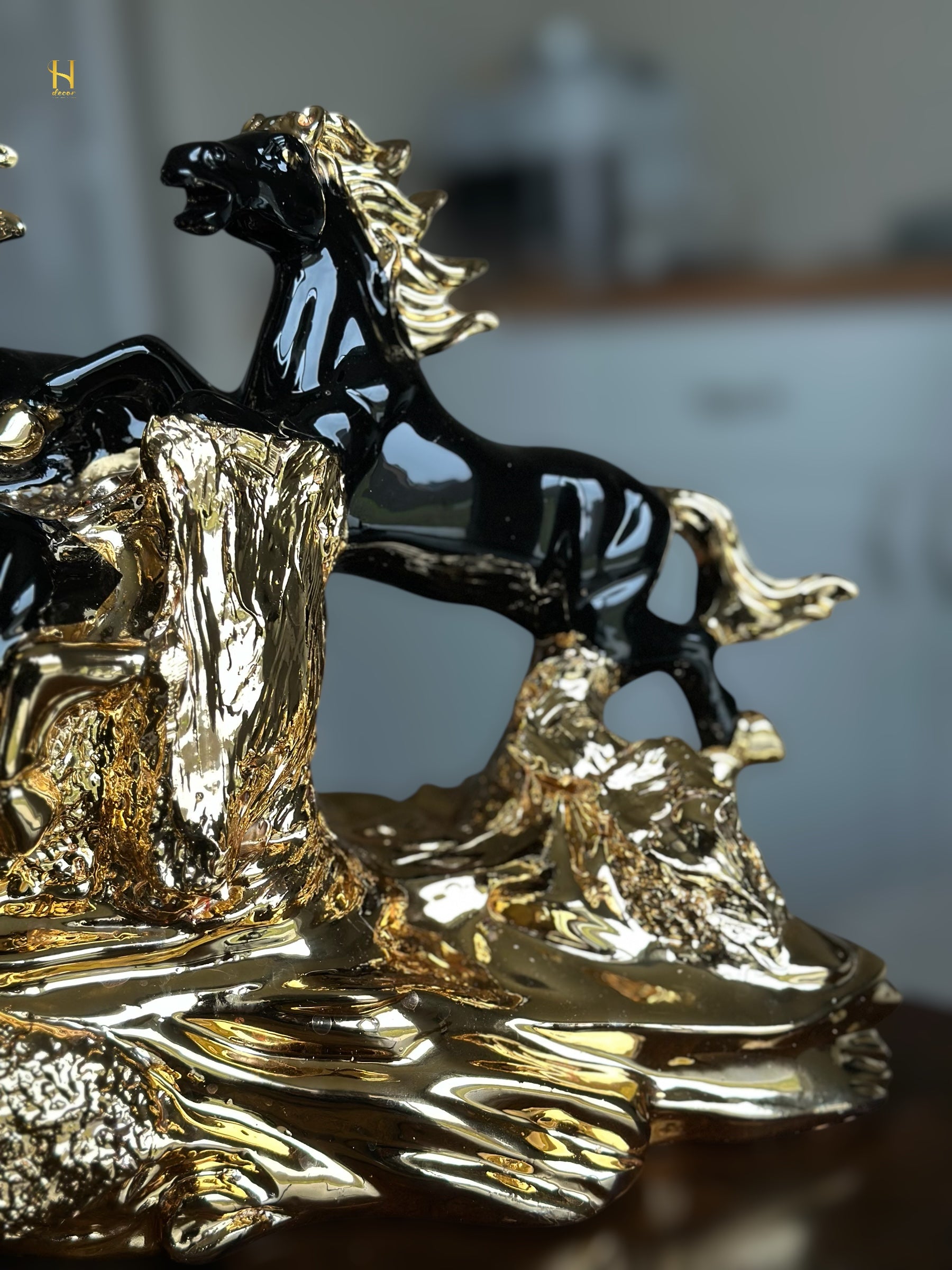 Seven Black and Golden Horses Sculpture