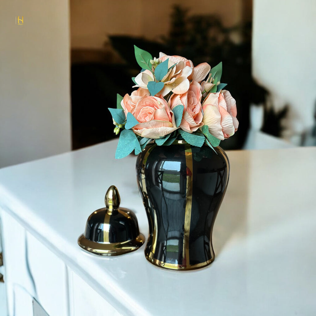 Black ginger jar with golden stripes
