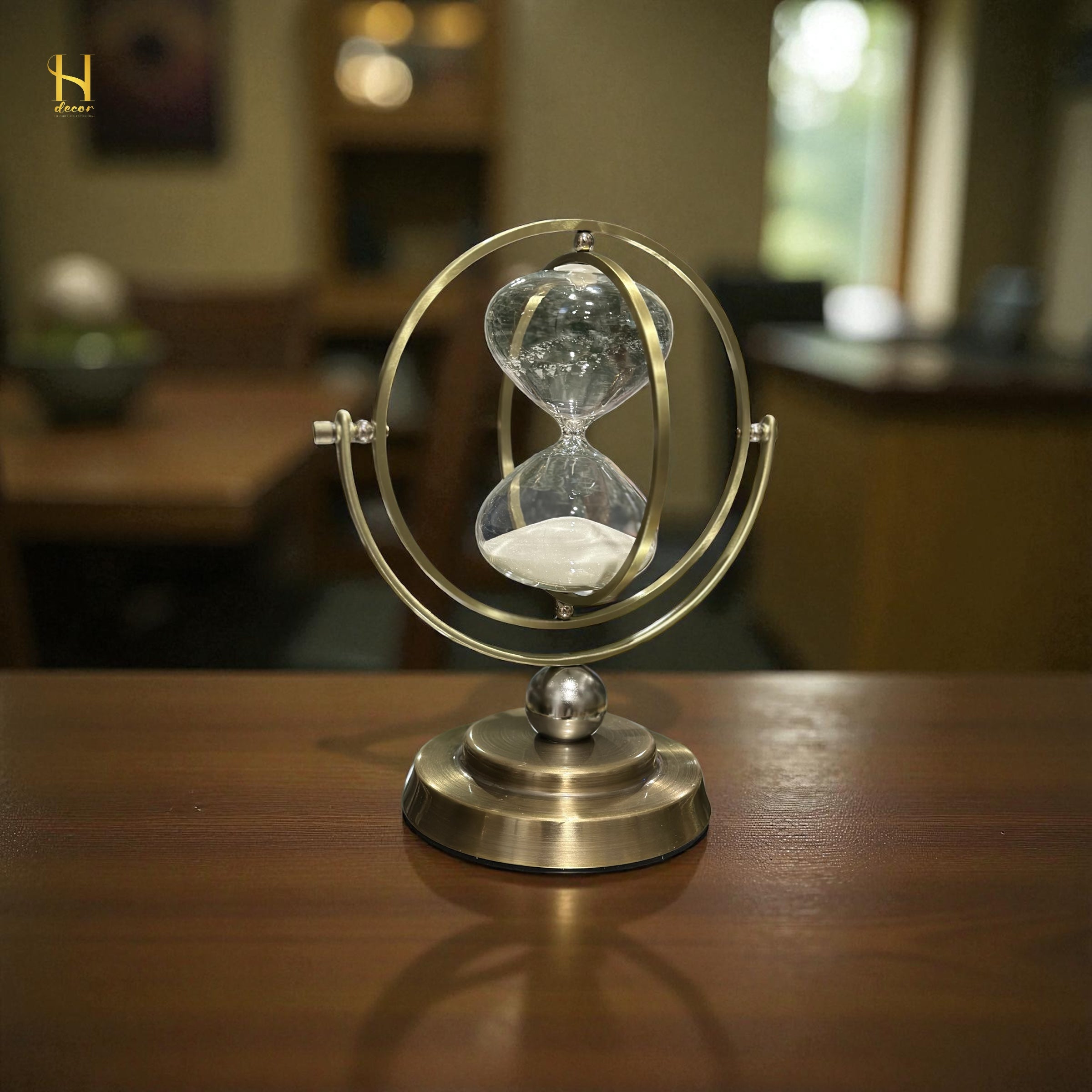 Brass-Tone Metal Hourglass with 360° Rotating Globe Frame